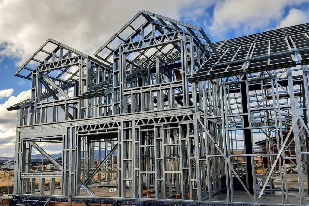 Vivienda Unifamiliar. Estructura de Steel Frame. Planta baja y primera bajo cubierta a dos aguas con buhardas.